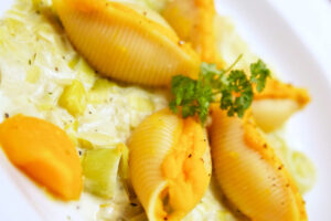 Conchiglioni with pumpkin and leek sauce