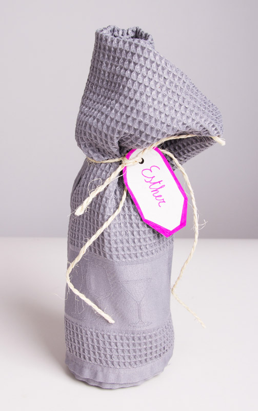 Use a package that is part of the gift itself. For example a scarf, a nice box, a cooking pot, ...